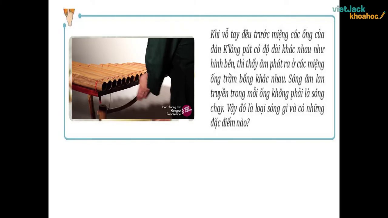 Một sợi dây đàn hồi được gắn vào bộ rung, minh họa cho thí nghiệm tạo sóng dừng cơ bản.